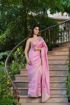 Gorgeous light pink tussar georgette saree is a perfect choice for weddings and festive occasions!. It has an embroidered border and comes with a blouse piece. Disclaimer: The actual product may vary slightly from the image. These are custom orders, hence expect slight variation in color, placement of the motif or buta. ESTIMATED DELIVERYBecause this is a custom order, it would take about 4 weeks from the date of purchase. RETURN POLICYThis product is a custom order and cannot be returned or exchanged. Traditional Pink Pre-draped Saree With Embroidered Border, Elegant Pink Pre-draped Saree With Embroidered Border, Pink Pre-draped Saree With Embroidered Border For Diwali, Pink Saree With Embroidered Border For Diwali, Navratri Pink Blouse With Embroidered Border, Pink Pre-draped Saree With Embroidered Border For Eid, Diwali Pink Saree With Embroidered Border, Festive Pink Pre-draped Saree With Embroidered Border, Designer Pink Saree With Embroidered Border