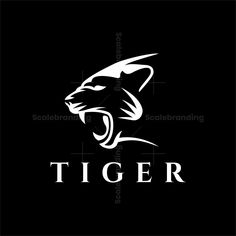 the tiger logo on a black background with white letters and an animal's head