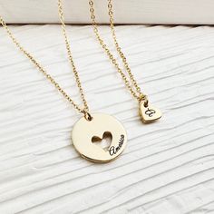 "Personalized Mother and Daughter Necklace Set. Mommy and Me Two Necklaces. Beautiful Mother's Day Gift. Heart Necklace. Child and Mom Jewelry Set. This necklace is the most unique and special gift for your mom. D E T A I L S * Material: Brass * Color: 16K gold plating / Original rhodium plating / Rose gold plating * Big coin size: 17mm, 1.7mm thick * Small heart size : 7x8mm, 2mm thick * Chain length : 17.5\" H O W ∙ T O ∙ O R D E R * Choose the color of material. * Choose the number of small heart necklace. * Leave us a note about your personalization details. Ex) Big coin - The character limit is 15.       Small heart - Only one initial allowed. * If you want specific chain length, leave us your desired length. We are happy to work for your special necklace :) A B O U T ∙ B I J O U X ∙ Personalized Round Pendant Heart Necklace For Everyday, Valentine's Day Round Pendant Necklace With Charms, Everyday Double Heart Necklaces For Mother's Day, Everyday Heart Charm Necklaces For Mother's Day, Heart Beads Necklace For Mother's Day, Everyday Heart Necklace For Mother's Day, Everyday Round Heart Necklace For Mother's Day, Everyday Heart Beads Necklace For Mother's Day, Heart Pendant Charm Necklace For Birthday And Mother's Day