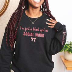 Welcome to Meadow Manor Prints, where empowerment meets style! 🌸 Elevate your social work era with our exclusive CUSTOM Black Girl Social Worker Gildan 18000 Sweatshirt, featuring a chic pink bow in the feminine balletcore style. This comfy sweatshirt is perfect for MSW graduation or as a thoughtful gift for the amazing social worker in your life. 🎀 **Graphic Details - Feminine balletcore-style pink bow - Celebrate the strength of a Black Girl Social Worker 🌈 **Product Highlights - Gildan 180 Social Worker Sweatshirt, Msw Graduation, Photo Care, Unique Sweatshirt, Social Worker, Style Pink, Chic Pink, Comfy Sweatshirt, Social Work