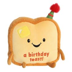 a stuffed toy with a happy birthday toast on it