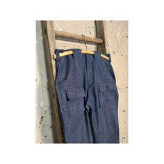 1970s Big E Levi's Bush pants . Dark wash , 6 pocket , straight leg Levis STA PREST Slacks .  New old stock , never worn condition - missing buttons . 28 waist. Great condition - See photos .  Brand: Levis  Size: 28 waist - please see measurements below  Waist: 14.5 inches  Length: 40.5 inches Inseam : 30.5 inches Thigh: 18.5 inches  Front rise - 12.5 inches  Leg opening: 9.5 inches Vintage Straight Leg Cargo Jeans With Side Pockets, Vintage Denim Blue Cargo Jeans, Retro High Waist Cargo Jeans With Pockets, Retro High Waist Cargo Jeans, Retro High-waist Cargo Jeans With Pockets, Retro Denim Blue Bottoms With Pockets, Vintage Denim Bottoms With Side Pockets, Vintage Straight Leg Cargo Pants With Patch Pockets, Retro Full-length Cargo Pants With Pockets