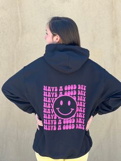 "NEW! \"Have a Good Day\" Print on back with Smiley Face Print on left front chest , color black by Touch of South. Print in USA. Cozy up this season with our latest collection of hoodies oversized sweatshirt and sweatshirts. Featuring a soft material perfect for chill days, this style is ideal for layering under a trench coat in fall, or wearing alone when the days start to get a little warmer. For days at home, pair a relaxed-fit hoodie and prepare for comfort heaven. Style: Printed Hoodie, So Fun Hoodie Sweatshirt With Drawstring Hood, Fun Sweatshirt With Drawstring Hood, Cute Black Hoodie With Graphic Print, Fun Hooded Graphic Print Sweatshirt, Fun Graphic Print Hoodie, Fun Hoodie With Letter Print For Streetwear, Black Letter Print Fun Sweatshirt, Fun Letter Print Hoodie For Streetwear, Fun Hooded Hoodie With Letter Print