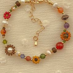 Clementine Bracelet Fall Flower Bracelet Handmade Whimsical Beaded Bracelet Gold Filled Jewelry Adjustable Gemstone Bracelet - Etsy Flower Beaded Bracelet, Fall Bead, Seed Bead Choker, Bracelet Flower, Spring Bracelet, Carnelian Bracelet, Fall Flower, Orange Crystals, Pretty Necklaces