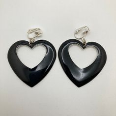 Very pretty heart clip on earrings in excellent condition. Accented with a layer of black enamel. The enamel has the appearance of texture but feels smooth. They are light weight for their size. View more earrings here: https://www.etsy.com/shop/PalomaAndBianca?ref=seller-platform-mcnav&section_id=28740715&page=1#items Head over to PalomaAndBianca.com to join our email list and receive exclusive discounts! Our jewelry is vintage and/or preowned. Therefore, there may be some patina or imperfectio Heart Clip, Pretty Heart, Emerald Green Earrings, Seashell Pendants, Seashell Necklace, Silver Pin, Sterling Silver Flowers, Green Earrings, Silver Flowers