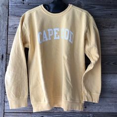 The Cape Cod Crewneck Sweatshirt is hand-dyed in small batches and smells as fresh as it looks! A top-seller, this comfort colored yellow Cape Cod Crew is made from 80% cotton with 20% polyester for added durability. Garment washed for extra luxury, our cozy crewneck offers a fashionably worn-in texture for super style Casual Washed Crew Sweater, Casual Washed Crew Neck Sweater, Acid Wash Crew Neck Tops, Acid Wash Crew Neck Comfortable Tops, Acid Wash Crew Neck Sweatshirt For Loungewear, Comfortable Acid Wash Crew Neck Top, Casual Soft-washed Cotton Sweater, Comfortable Cotton Crew Neck Sweatshirt, Casual Soft-washed Sweatshirt For College