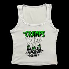 * Sublimated green psychobilly horror punk band cropped tank top * Mannequin is wearing size M * Mannequin measurements:    * Bust: 35" (C cup)    * Waist: 26"    * Hip: 40" * Soft, breathable, and stretchy material * For a looser fit, size up * Please note that all items are Made to Order & there may be slight variations in appearance Green Cotton Y2k Tank Top, Edgy Skull Print Sleeveless Tank Top, Halloween Grunge Sleeveless Vest, Grunge Sleeveless Vest For Halloween, Sleeveless Grunge Vest For Halloween, Y2k Style Green Crop Top For Streetwear, Edgy Skull Print Tank Top For Halloween, Edgy Halloween Streetwear Vest, Alternative Style Halloween Streetwear Vest