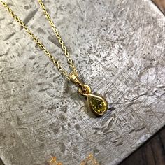 Green tourmaline gold-plated pendant. The necklace and the pendant are made in gold-plated silver. Material: vermeil, gold-plated silver Stone: green tourmaline Necklace:45cm Do not hesitate to check my Instagram as well: https://www.instagram.com/atelier_tiuh/ To go back to my shop: https://www.etsy.com/shop/AtelierTiuh?listing_id=780035814&ref=shop_overview_header Yellow Gold Charm Necklace With May Birthstone, Gold Plated Charm Necklaces With Gemstone, Yellow Gold Plated Birthstone Pendant Necklace, Gold Plated Yellow Gold Birthstone Pendant Necklace, Gold Gemstone Teardrop Pendant Jewelry, Gold Teardrop Pendant Jewelry With Gemstone, Gold Plated Teardrop Gemstone Necklace, Gold Plated Teardrop Pendant Necklace With Gemstone, Gold Sterling Silver Necklace With Gemstone