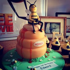 a birthday cake made to look like a honey bee