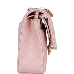 This Medium Classic Double Flap bag is in Light Pink lambskin leather with light gold tone hardware and features a front flap with signature CC turnlock closure, half moon back pocket, and an interwoven light gold tone chain link and light pink leather crossbody/shoulder strap.   The interior is lined in pink leather with the "love letter" zipper compartment underneath the first flap, an "outer" slit pocket under the second flap, and an interior compartment with two open pockets separated by a "lipstick" compartment. Collection: 23S (RFID Chip)   Origin: France   Condition: Pristine, new or never worn   Accompanied by: Chanel box, Chanel dustbag, carebook, ribbon, and UPC   Measurements: 10" width x 6" height x 2.75" depth; 16.5" strap drop (9.5" doubled) Chanel Box, Bag Light, Somali, Sierra Leone, Flap Bag, Pink Leather, Lambskin Leather, Half Moon, Brunei