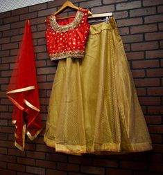 *Net Dupatta with gold border *Skirt with Full Gold Embroidery *Gold Beading on Blouse *Readymade Lehenga Choli/Crop Top Set *Size: Blouse Bust: 40 inches (+ 2 inch margin) Waist: 36 inches (+2 inch margin) Skirt length: 41 inches Skirt waist: 37 inches *Color May Vary Slightly From Picture *Our store is located in Los Angeles Semi-stitched Sets With Gold Embroidery And Traditional Drape, Festive Sharara With Gold Embroidery, Gold Embroidered Sharara In Chinon, Festive Raw Silk Sharara With Gold Embroidery, Festive Sharara With Gold Embroidery In Raw Silk, Festive Sharara With Gold Embroidery In Chinon, Gold Sharara With Gold Embroidery In Chinon, Gold Embroidered Chinon Sharara, Traditional Floor-length Choli For Celebrations