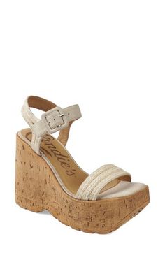 A cork-textured platform-wedge sole amplifies the earthy vibes of an outfit-making sandal topped with a woven ankle strap. 5" heel; 2" platform Adjustable ankle strap with buckle closure; hidden elastic inset Textile upper/leather lining/synthetic sole Imported Cork Wedge Heel Sandals For Summer, Spring Beach Wedge Sandals With Cork Material, Cork Wedge Sandals For Summer, Summer Open Toe Cork Wedge Sandals, Summer Cork Wedge Sandals With Open Toe, Summer Cork Wedge Sandals, Spring Beach Cork Wedge Sandals, Platform Cork Wedge Sandals For The Beach, Cork Wedge Heel Sandals For Vacation