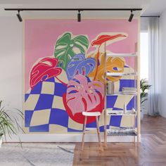 an abstract painting with flowers on a checkered background wall mural in a living room