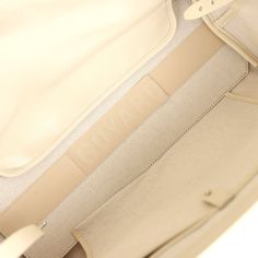 This 2024 Limited Edition Bellechasse Biaude PM bag is of sand Goyardine coated canvas and sand chevroches calfskin leather with palladium hardware, featuring two sand flat leather top handles and trim, a removable closure clip, and tonal stitching.The interior is lined in white natural canvas and has one interior floating pocket on the front wall.Origin: FranceCondition: New and never worn (plastic on handles)Accompanied by: Dustbag, closure clip and carebookMeasurements: 10.6" x 5.9" x 14.1"; Classic Beige Epsom Leather Shoulder Bag, Cream Epsom Leather Bag For Everyday Use, Luxury Beige Epsom Leather Shoulder Bag, Beige Coated Canvas Shoulder Bag For Errands, Luxury Beige Coated Canvas Shoulder Bag, Luxury Textured Leather Bags With Canvas Material, Designer Leather Bag In Neutral Color, Luxury Cream Shoulder Bag For Travel, Beige Rectangular Epsom Leather Shoulder Bag