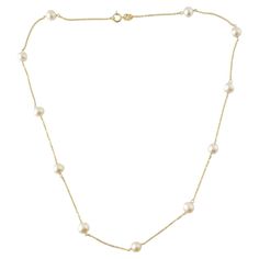 14K Yellow Gold Pearl Chain Necklace #16877 This breathtaking 14K gold chain necklace features 11 beautiful pearls! Chain length: 16" Pearl size: approximately 5.84mm each Weight: 2.47 dwt/ 3.85 g Hallmark: RCI 14K Very good condition, professionally polished. Will come packaged in a gift box or pouch (when possible) and will be shipped U.S. Priority Mail Insured. MM031124/17KCS Luxury Yellow Gold Pearl Chain Necklace, Classic Yellow Gold Pearl Chain Necklace, White Classic Pearl Necklace With Cable Chain, Classic Chain Necklace With Pearl Charm For Formal Occasions, Classic Formal Chain Necklace With Pearl Charm, Formal White Pearl Necklace With Cable Chain, Classic Pearl Chain Necklace For Formal Occasions, Classic Pearl Chain Necklace For Formal Events, Formal Pearl Necklace With Cable Chain