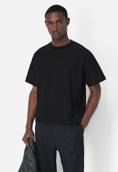 Boxy, cropped fit tee with dropped shoulders. Designed with recycled cotton. Ribbed neck. Reversed inside-out stitch details through. Reactive dye treatment for deep, solid coloration. Made in Los Angeles.100% Cotton. Black Cropped Tee Outfit, Boxy Cropped Tee, Cropped Tee Outfit Men, Boxy Tee Outfit, Cropped Shirt Men, Cropped Tee Outfit, Drop Shoulder Tshirt, Markiplier Fnaf, General Outfit