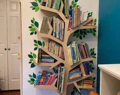 a tree shaped book shelf with books on it