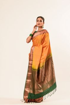 Discover the elegance of our Mustard Yellow Kanjeevaram Silk Saree, featuring intricate Mayil butas in pure gold Zari. This handwoven masterpiece comes with a green and gold border, adorned with Zari detailing. Festive Gold Traditional Wear For Ceremonies, Gold Traditional Wear With Meenakari For Transitional Season, Traditional Gold Silk Traditional Wear, Gold Traditional Wear In Art Silk, Traditional Gold Silk Wear, Gold Anarkali Traditional Wear With Zari Weaving, Gold Paithani Silk Traditional Wear For Eid, Gold Paithani Silk Traditional Wear For Ceremonies, Gold Traditional Wear With Pallu