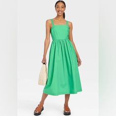 Women's Sleeveless Sundress In Green Green Sleeveless Dress For Summer Brunch, Sleeveless Sundress For Spring Brunch, Spring Sleeveless Midi Dress, Sleeveless Cotton Sundress For Brunch, Green Cotton Midi Length Sleeveless Dress, Green Cotton Midi-length Sleeveless Dress, Green Cotton Sleeveless Midi Dress, Green Casual Sleeveless Dress For Spring, Chic Green Sleeveless Dress For Spring