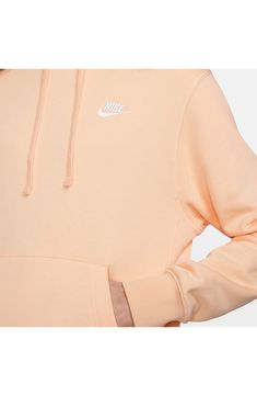 Peach Nike Hoodie, Nike Hoodie With Ribbed Cuffs For Spring, Nike Sporty Hoodie For Spring, Nike Sporty Spring Hoodie, Nike Casual Sweatshirt With Kangaroo Pocket, Nike Fleece Hoodie For Spring, Nike Spring Sweatshirt With Drawstring Hood, Nike Solid Color Hoodie With Drawstring, Sporty Hoodie With Kangaroo Pocket For Spring