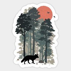 a wolf walking through the woods in front of a red sun