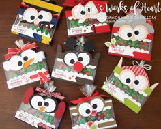 six christmas gift bags with owls on them