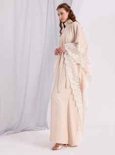 WF ATELIER Model height: 177 CM 100% Polyester Length: 140cm Elegant Flowy Spring Abaya, Beige Maxi Length Kaftan For Spring, Beige Kaftan For Spring Daywear, Spring Long Abaya, Elegant Spring Tunic Abaya, Elegant Beige Tunic Maxi Dress, Elegant Beige Maxi-length Kaftan, Elegant Beige Maxi Length Kaftan, Elegant Maxi Length Daywear Kaftan