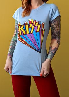 "I was made for lovin' you, baby..." Totally '70s-inspired KISS tee with colorful rainbow and star design, all on a baby blue tee. This tee has a slim, fitted, bodycon style to keep with the retro vibe. Features: Slim, retro fitted tee Short cap sleeves Colorful, distressed KISS graphics at front Baby blue colorway Officially licensed Brand & Fabric Content: Brand: Daisy Street x Rock OffMaterials: 100% cotton Made in: Imported Fit: True to size with a fitted, retro style. Taylor is 5'3 with a 3 Bodycon Style, Fitted Tee, Blue Tee, Bodycon Fashion, Colorful Rainbow, Star Design, 70s Inspired, Retro Vibe, Star Designs