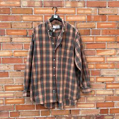 button down  oversized  the big shirt  great vintage condition - very little wear found in: denver brand: abercrombie & Fitch  tag size: xl fits like a modern: up to masc 2xl  / femme 3xl  measurements: bust - 55in length - 31.5in sleeve - 25in back - 22in material: cotton origin: malaysia colors: brown green red instagram - feverdreamdenver Oversized Brown Button-up Flannel Shirt, Oversized Classic Plaid Flannel Shirt, Big Shirt, Colors Brown, Brown Plaid, Abercrombie Fitch, Vintage Y2k, Denver, Button Downs