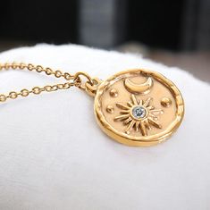 Elevate Your Style With This Stunning Celestial Necklace ! Featuring An Intricately Detailed Sun And Moon Medallion, This 18k Gold Plated Stainless Steel Pendant Is Both Minimalistic And Eye-Catching. Perfect For Layering Or Wearing Solo, This Piece Will Quickly Become Your Everyday Favorite. With A Delicate Chain And A Touch Of Sparkle, It's A Timeless Design For Any Occasion! Features: 18k Gold Plated For Lasting Shine Durable Stainless Steel Intricate Sun & Moon Medallion Design Minimalist, Y Sun Moon Necklace, Celestial Pendant, Gold Medallion Necklace, Sun And Moon Necklace, Astrology Jewelry, Celestial Necklace, Gold Medallion, Boho Chic Jewelry, Gold Statement Necklace