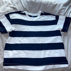 Navy Blue And White Striped Tee From Old Navy, Size M. Thicker Material Tee Shirt, Never Worn. Open To Offers! Navy Crew Neck Top With Contrast Stripes, Navy Short Sleeve Tops With Contrast Stripes, Navy Short Sleeve Top With Contrast Stripes, Casual Blue Shirt With Contrast Stripes, Casual Blue Tops With Contrast Stripes, Relaxed Fit Blue Tops With Contrast Stripes, Blue Relaxed Fit Tops With Contrast Stripes, Blue Cotton Top With Contrast Stripes, Oversized Cotton Top With Contrast Stripes