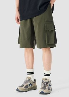 Experience functionality and style with our Cargo Utility Shorts, complete with a zippered pocket for the modern man on the go. Crafted from a breathable blend of 90% nylon and 10% spandex, these shorts feature a low waist, loose straight fit, and ice silk quick-drying properties for ultimate comfort. The edgy design includes a durable dual-duty stitch, ample storage with a large utility pocket, and a classic straight-cut hem for a relaxed silhouette. Versatile and comfortable, these shorts are Short Cargo, Utility Shorts, Edgy Design, Shorts Cargo, Low Waist, Modern Man, Army Green, The Go, The Modern