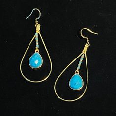 These Simple And Elegant Earrings Are Hand Made. The Golden Teardrop Features A Teardrop Shaped Turquoise Stone As Well As Turquoise And Gold Glass Seed Beads. They Feature French Hooks Aka Fishhooks. Order Includes 2 Silicone Earring Backs (Not Pictured) For Security. Elegant Turquoise Drop Teardrop Earrings, Turquoise Teardrop Drop Earrings With Ear Wire, Turquoise Teardrop Drop Earrings, Blue Teardrop Chandelier Earrings For Pierced Ears, Turquoise Teardrop Chandelier Earrings As Gift, Blue Long Drop Teardrop Earrings For Pierced Ears, Blue Long Drop Teardrop Earrings, Turquoise Teardrop Chandelier Earrings For Pierced Ears, Blue Teardrop Earrings With Ear Wire