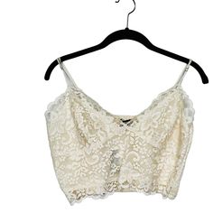 Express Ivory Lace Camisole With Adjustable Straps Size Large. Lined In The Front For Better Coverage. 11” Long, 17” Pit To Pit With Great Stretch,67% Cotton,18% Nylon, 15% Rayon In The Front, 100% Polyester In The Back.Nwt Lace Camisole, Summer Fits, Ivory Lace, Dream Wardrobe, Adjustable Straps, Womens Tops, Collage, Wardrobe, Cream