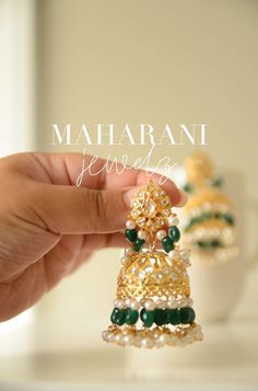 The perfect accessory for literally ANY Southeast Asian event. Chandelier earrings with faux emeralds. 21k gold plated on silver. Approximately 3 inches long Elegant Pearl Earrings With Dangling Beads For Festivals, Elegant Kundan Chandelier Earrings With Dangling Beads, Elegant Kundan Danglers With Dangling Beads, Elegant Kundan Danglers With Beads, Elegant Danglers With Dangling Beads For Diwali, Elegant Diwali Danglers With Dangling Beads, Chandbali Jewelry With Dangling Beads For Diwali, Elegant Festive Jhumkas With Dangling Beads, Elegant Jhumkas With Dangling Beads For Festive Occasions