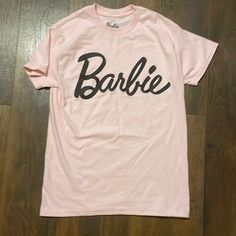 Barbie T-Shirt. Oversize Shirt. Never Worn. Nwt. Spring Short Sleeve T-shirt With Lettering, Spring T-shirt With Lettering, Short Sleeve, Spring T-shirt With Lettering, Pink Lettered Top For Streetwear, Pink Tops With Lettering For Streetwear, Pink Streetwear Top With Lettering, Pink Streetwear Tops With Lettering, Trendy Short Sleeve T-shirt With Lettering, Pink Cotton Tops With Lettering