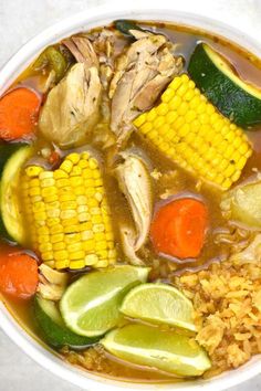 a white bowl filled with soup and vegetables