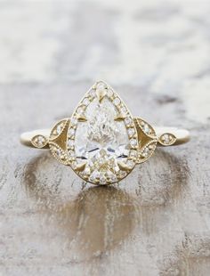 caption:Shown with a 1.23ct center diamond Marquise Engagement Ring Halo, Pear Engagement Ring Halo, Yellow Engagement Rings, Custom Ideas, Yellow Gold Setting, Rose Gold Engagement, Oval Cut Diamond, Pear Diamond, Pear Shaped Diamond