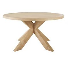 a round wooden table with two crossed legs