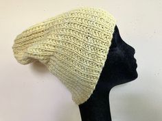 Letter sizes are an estimate- see numerical measurements and info about ease/fit below Gender neutral adult size medium super slouch fitting lightweight beanie hat hand knit in ribbed stitch from 100% wool yarn in a beautiful pastel yellow. Drapes and stretches nicely due to ribbing. Natural fiber is soft and breaths well while providing unparalleled warmth. Great hat for cold weather. Unstretched flat actual item measurements (compare to head size for best fit): Hat band 19 inches around Height is 11 inches tall Will stretch an extra 2-3 inches Care instructions: Hand wash cold, lay flat to dry. Ease is the amount of room a garment allows the wearer beyond the measurements of their body. For example, if your waist measures 30 inches, and the waist of the garment you want to buy also measu Fitted Knit Casual Hats, Casual Fitted Knit Hats, Casual Slouchy Bonnet, Casual Slouchy Crochet Cap, Spring Beanie, One Size Fits Most, Spring Solid Color Beanie, One Size Fits Most, Casual Fitted Beanie Bonnet, Casual Lightweight Beanie One Size, Casual Slouchy Crochet Hat, One Size