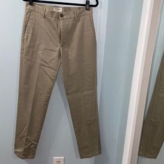 Khaki, Slim Tapered Pants. 30 X 32. Brand New. Open To Offers. Spring Full-length Chinos With Welt Pockets, Classic Mid-rise Work Pants For Spring, Classic Mid-rise Work Pants, Spring Business Casual Full-length Chinos, Spring Business Casual Full Length Chinos, Spring Full-length Chinos For Business Casual, Classic Mid-rise Dress Pants For Spring, Khaki Straight Leg Chinos For Spring, Spring Khaki Straight Leg Chinos