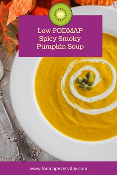 a bowl of pumpkin soup on a plate with the title low fodmap spicy smoky pumpkin soup