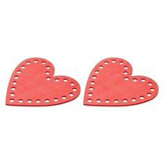 two red heart shaped cut outs with holes in the middle, on a white background