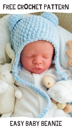 a baby wearing a blue knitted hat and holding a teddy bear with the caption free crochet pattern easy baby beanie