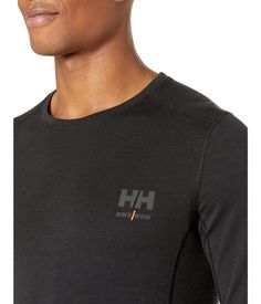 A perfect base layer option that easily layers, stay warm and comfy with the Helly Hansen® Lifa Merino Crewneck..Long sleeves, crewneck T-shirt with straight hemline..57% merino wool, 43% polypropylene..Machine wash, dry flat..Imported..Product measurements were taken using size LG. Please note that measurements may vary by size..Measurements: Length: 30 in Sporty Crew Neck T-shirt For Layering, Black Crew Neck Activewear For Layering, Casual Midweight Crew Neck Top, Stretch Crew Neck T-shirt For Outdoor Activities, Black Crew Neck Activewear For Outdoor Activities, Functional Go-dry Crew Neck Tops, Winter Technical Crew Neck Activewear, Casual Crew Neck Activewear With Snug Fit, Casual Crew Neck T-shirt