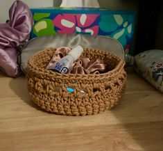 there is a basket with items in it on the table