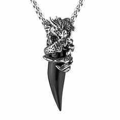 PRICES MAY VARY. Dragon Necklace: Retro gothic punk dragon crystal tooth design, classic simplicity. Every detail has been polished, authentic to the touch and extremely visual, comfortable to wear and a great choice for a club or Halloween party. Clothing to match the rock, goth and hip-hop styles Materials: Made of high-quality stainless steel and crystal with a delicate pattern that does not fade, hypoallergenic, rust, deform, making this pendant durable and suitable for long wear without dam Black Claw-shaped Halloween Jewelry, Gothic Streetwear Jewelry, Black Viking Metal Jewelry, Dragon Necklaces, Biker Party, Dragon Crystal, Enchanted Jewelry, Tooth Pendant, Tooth Design