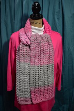 "This hand-knit scarf in tweedy shades of pink and grey will make a lovely addition to your fall wardrobe.  Made of soft acrylic yarn and knitted in a pretty pattern, this scarf will keep you warm and cozy as the days get cooler. 100% acrylic.  Machine wash cool and tumble dry low. Measures approximately 8.5\" wide and 72\" long.  Any perceived imperfections are due to the inherent characteristics of the color and/or texture of the yarn. This item also makes a lovely gift!" Pink Knitted Fall Scarf, Pink Knitted Scarves For Winter, Pink Knitted Winter Scarves, Hand Knit Scarf, Pretty Patterns, Shades Of Pink, Fall Wardrobe, Knit Scarf, Acrylic Yarn