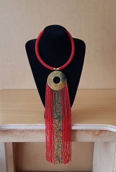 Beatiful women necklace. Main color: Red Available in different colors.  More necklaces here; https://www.etsy.com/shop/PrimeBeadsKe?ref=seller-platform-mcnav&section_id=33399833 All items are shipped through dhl express! Red Large Beads Choker Necklace, Red Bohemian Choker With Large Beads, Red Beaded Choker With Large Beads, Adjustable Red Necklace With Colorful Beads, Red Long Beaded Necklaces For Gifts, Red Long Necklace With Colorful Beads, Handmade Red Beaded Choker Necklace, Handmade Red Choker Necklace, Red Large Beads Choker As Gift