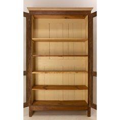 a wooden bookcase with three shelves on each side